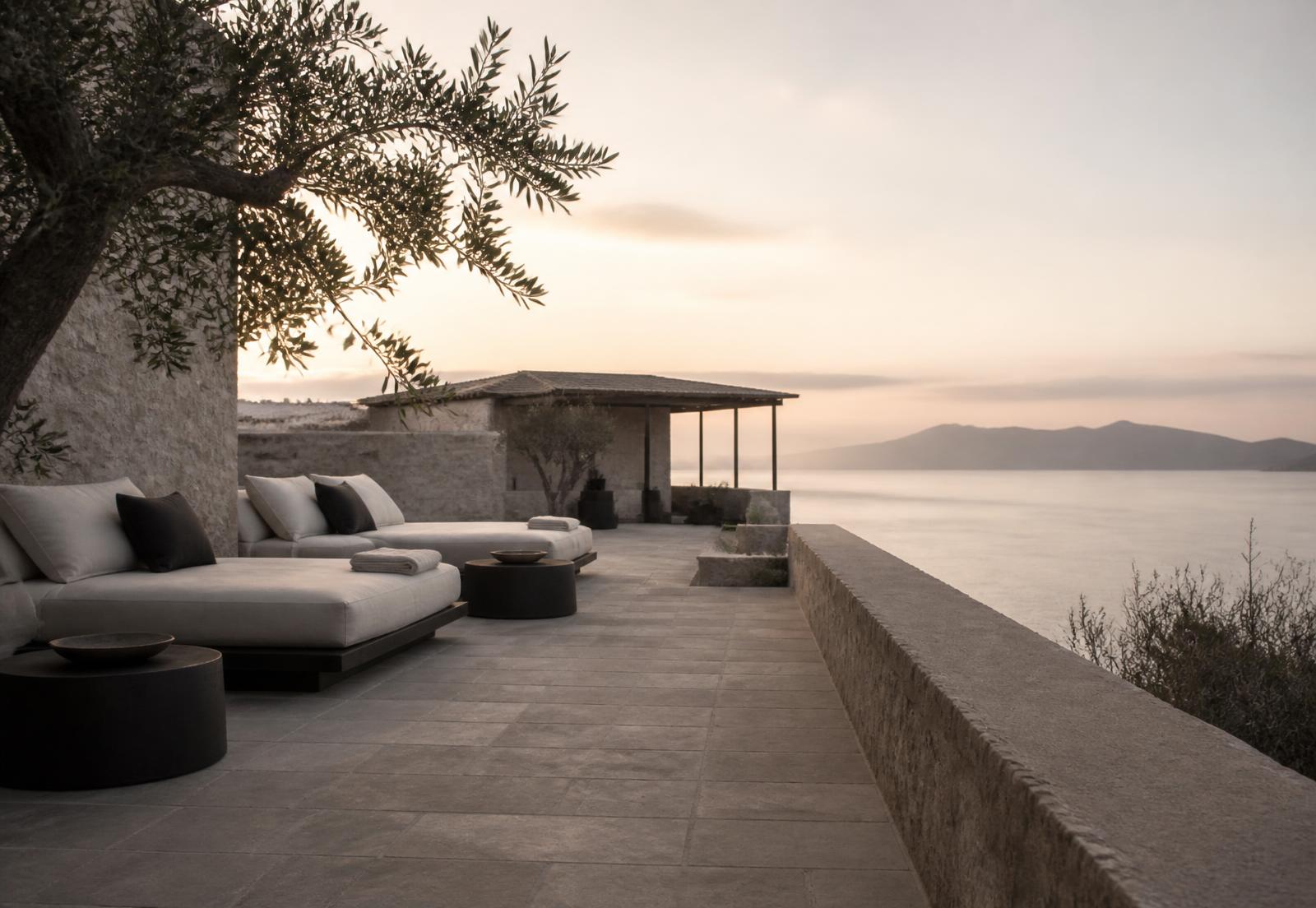 A quiet hotel terrace laid out for a morning session at sunrise